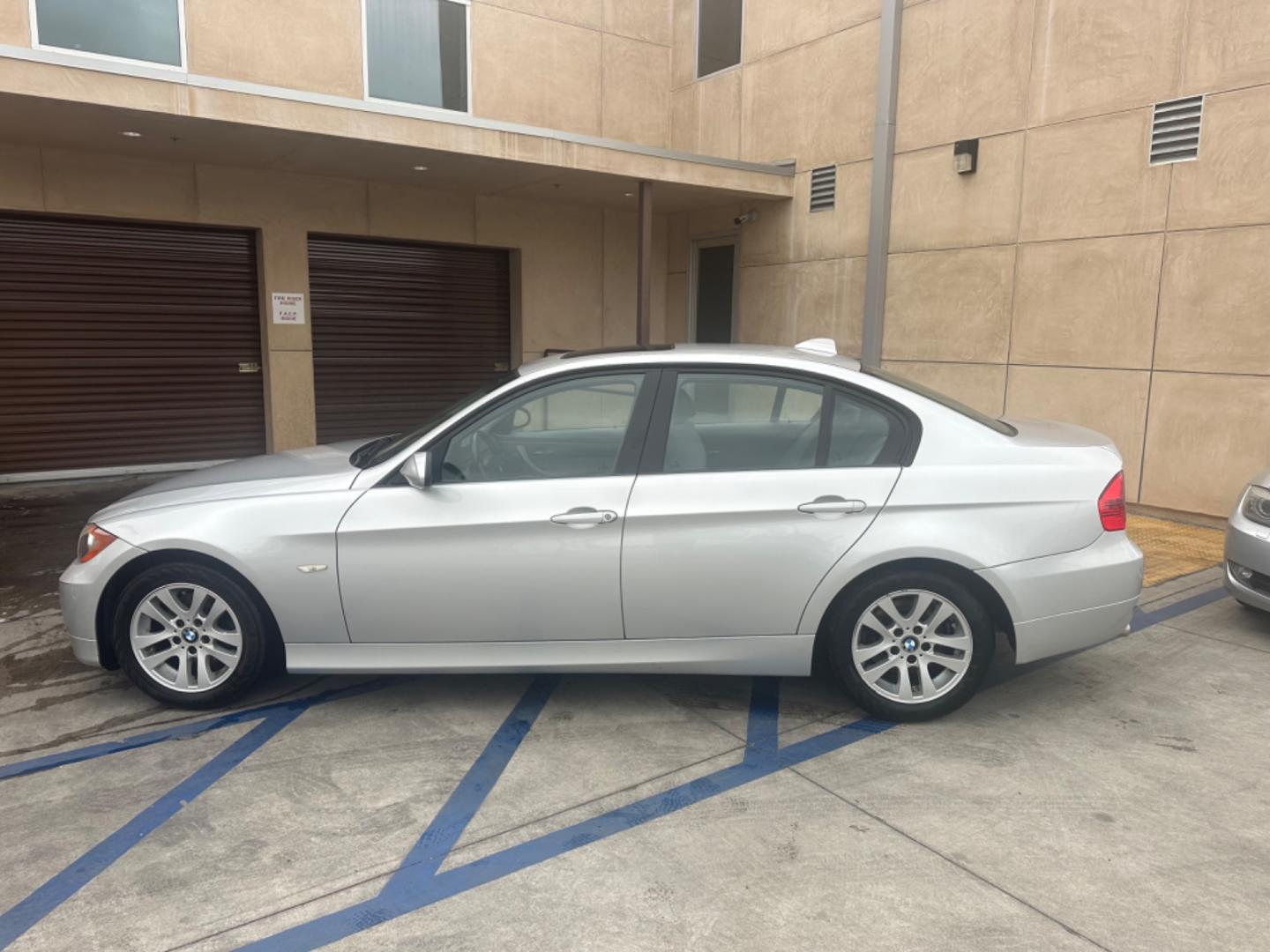 2007 Silver Metallic /Gray BMW 3-Series Leather (WBAVC53597F) with an 6 cylinder engine, Automatic transmission, located at 30 S. Berkeley Avenue, Pasadena, CA, 91107, (626) 248-7567, 34.145447, -118.109398 - "Discover Unmatched Value: 2007 BMW 328i at Our Pasadena Dealership" Are you in the market for a pre-owned vehicle that blends luxury, performance, and affordability seamlessly? Look no further than our esteemed dealership in Pasadena, CA, where we present to you the exquisite 2007 BMW 328i. Wit - Photo#1